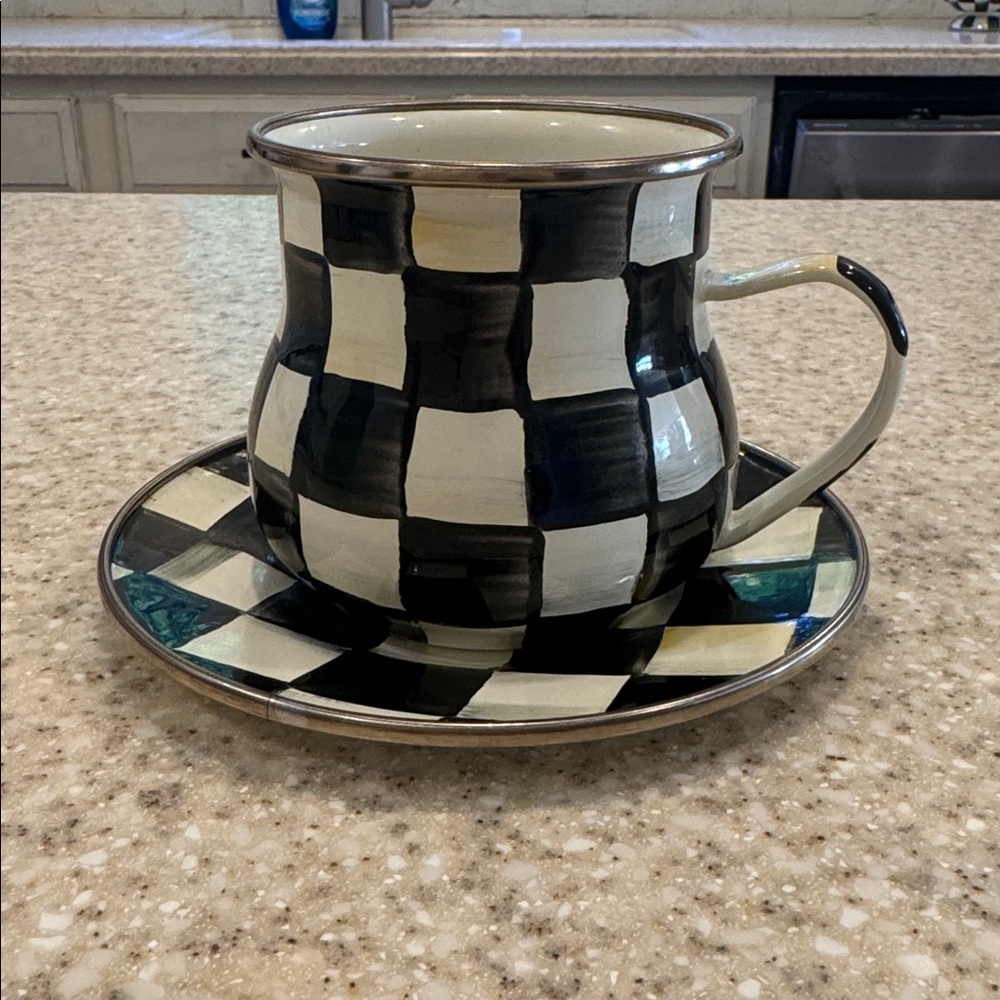MacKenzie-Childs Black and White Enameled Checkered Mug and saucer.